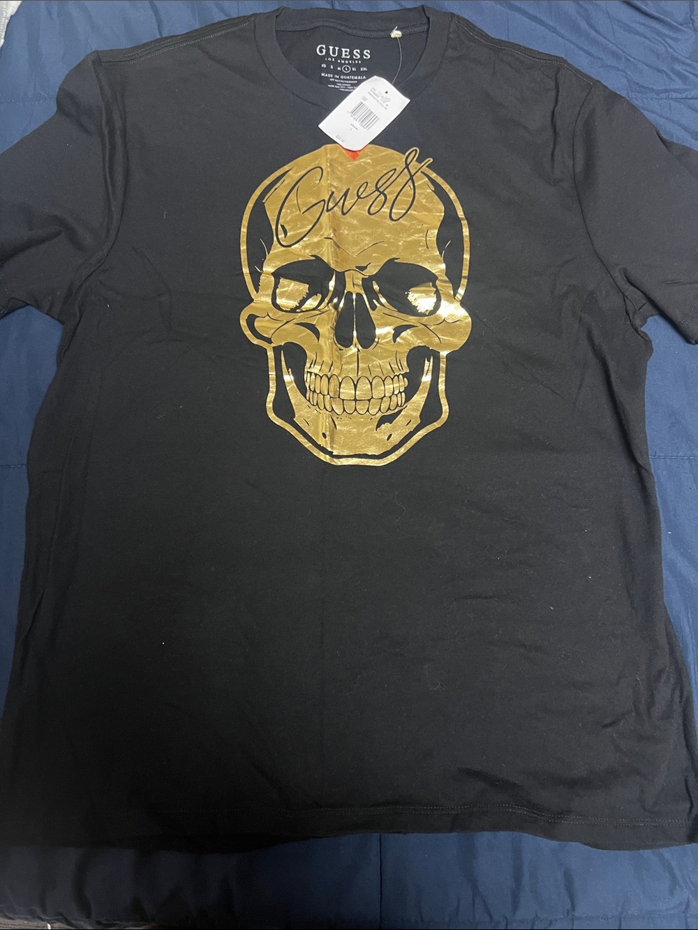 GUESS Black Short-Sleeve T-Shirt with Gold Skull Graphic